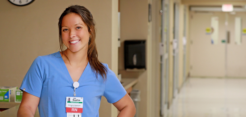 A shot of a young male registered nurse at Lexington Health.